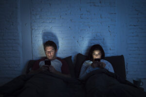 Revenge bedtime procrastination couple on phones